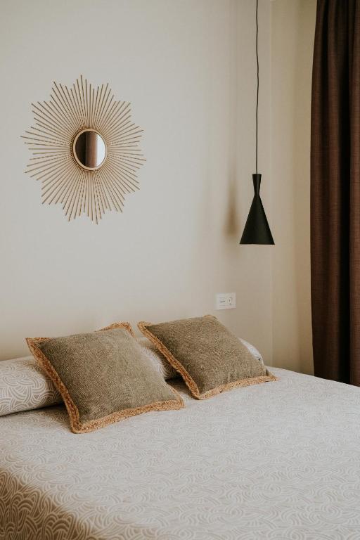 Posteľ alebo postele v izbe v ubytovaní Apartamentos Levante - Mares