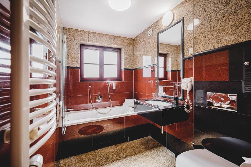Koupelna v ubytování Hotel Solaris