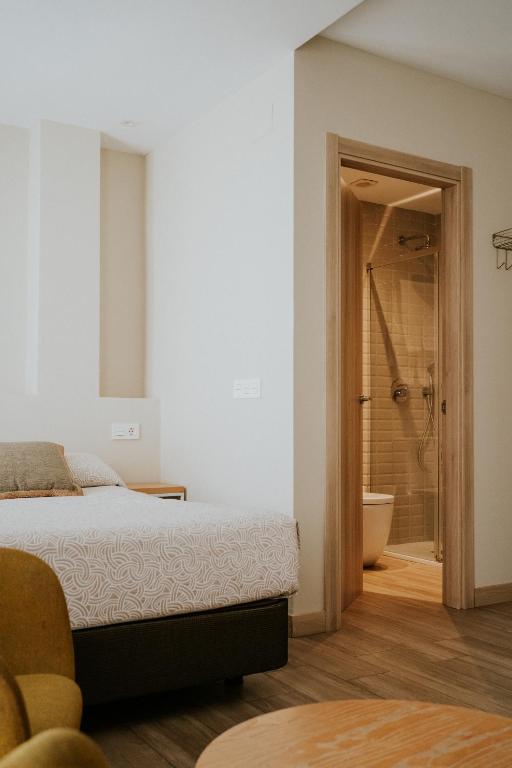 Posteľ alebo postele v izbe v ubytovaní Apartamentos Levante - Mares