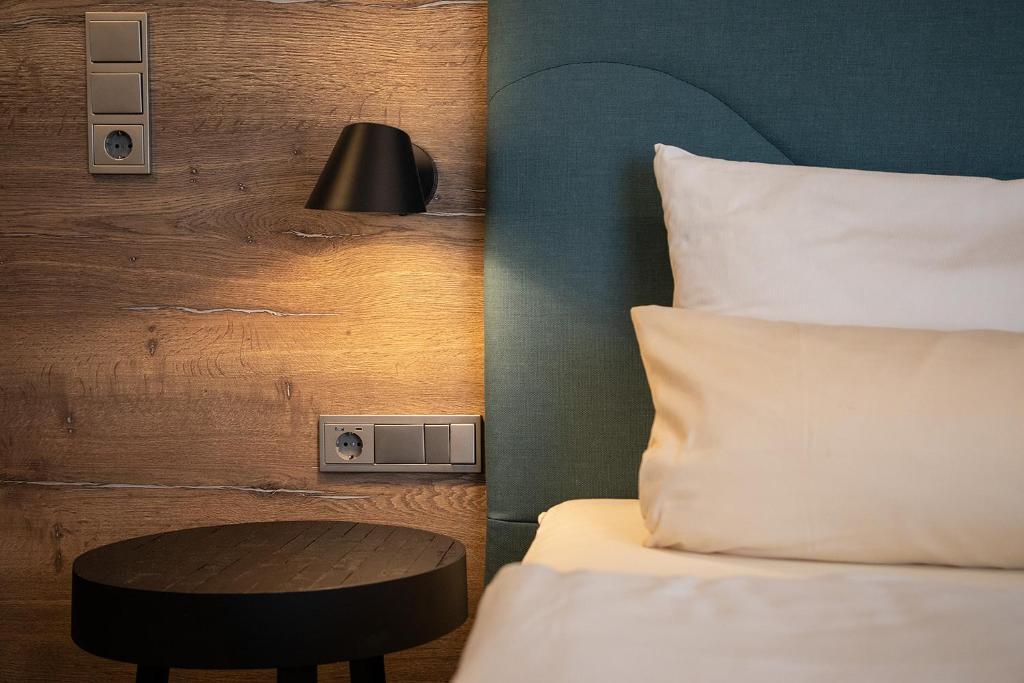 Postel nebo postele na pokoji v ubytování Hotel Imhof