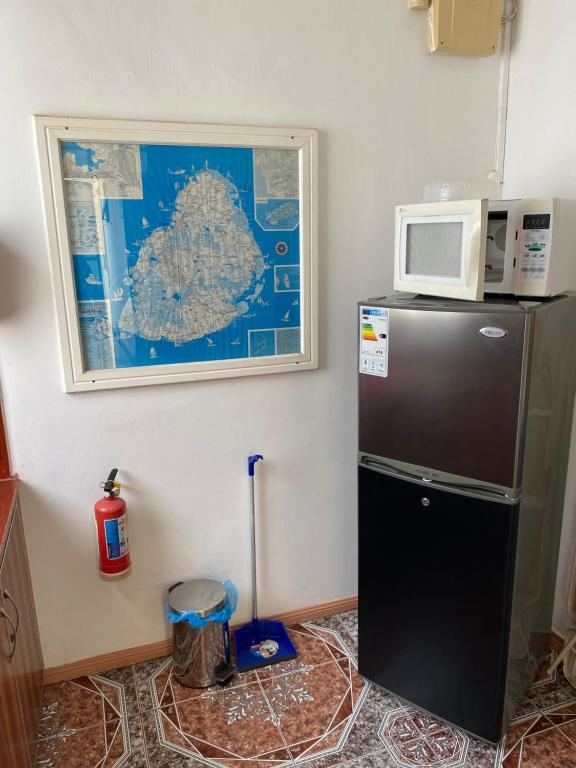 Kuchyň nebo kuchyňský kout v ubytování Apartments la Colombe