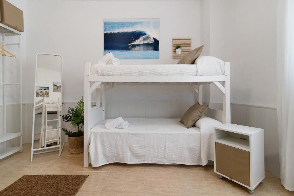 Postel nebo postele na pokoji v ubytování El Altillo House