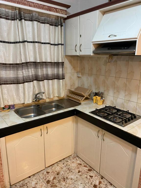 Kuchyň nebo kuchyňský kout v ubytování Apartments la Colombe