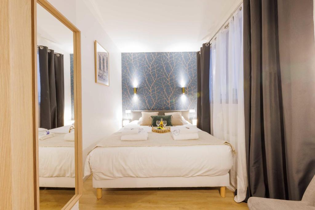 Postelja oz. postelje v sobi nastanitve Amazing Apartment - Paris Center - Gare de l&#39;Est R&eacute;publique