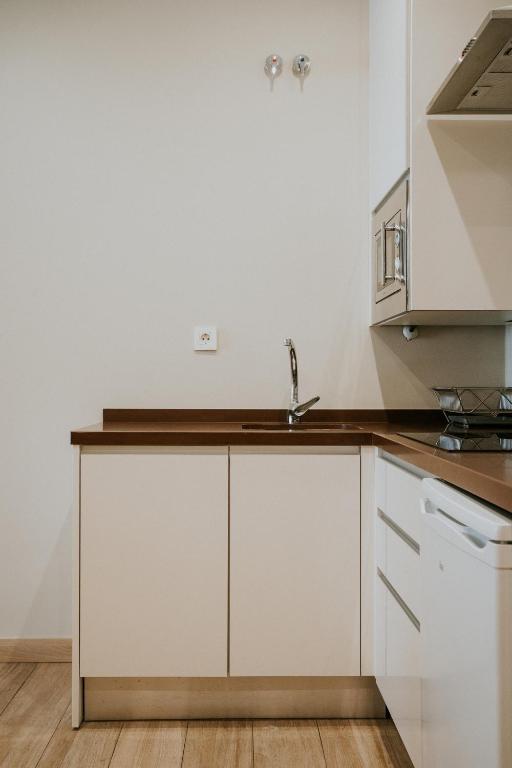 Kuchyňa alebo kuchynka v ubytovaní Apartamentos Levante - Mares