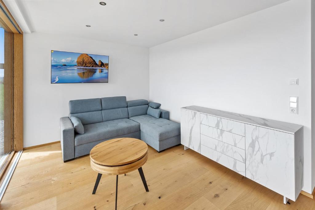 Uma área de estar em Luxus Chalet Max