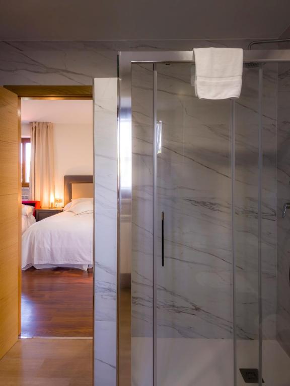 Postel nebo postele na pokoji v ubytování Casa Rural Camino Real Completa