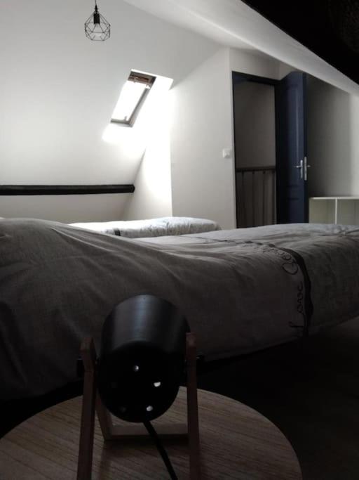 Posteľ alebo postele v izbe v ubytovaní Petite maison de l'ancien rivage