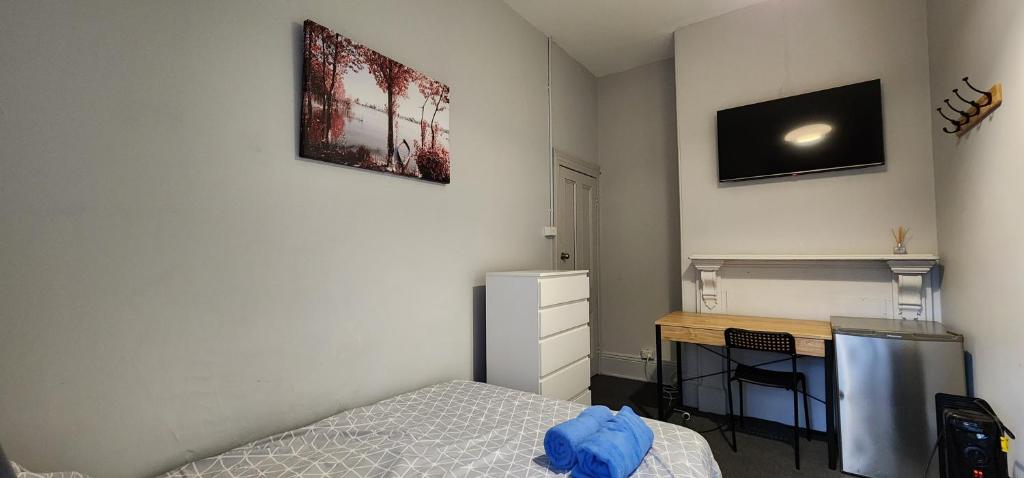 Postel nebo postele na pokoji v ubytování 50 Green St Windsor
