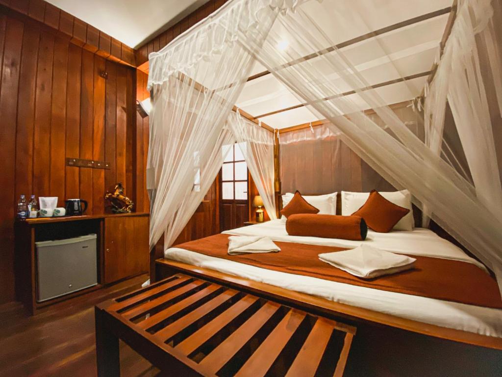 Postel nebo postele na pokoji v ubytování Hotel Levon Ella