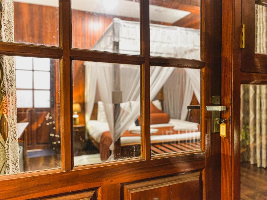 Postel nebo postele na pokoji v ubytování Hotel Levon Ella