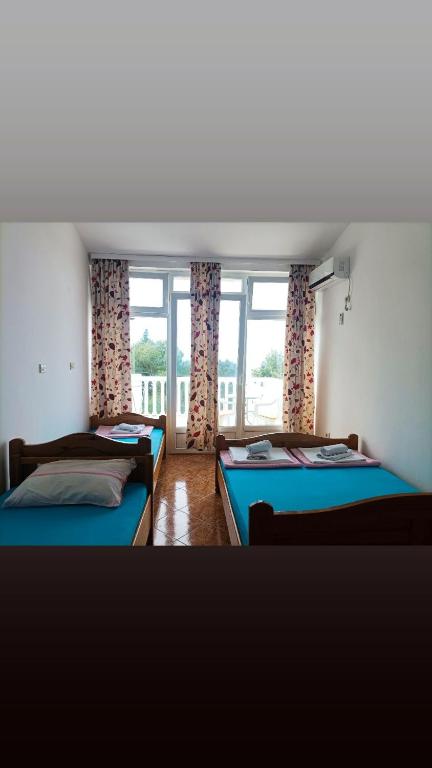 Postel nebo postele na pokoji v ubytování Joksimović apartmani