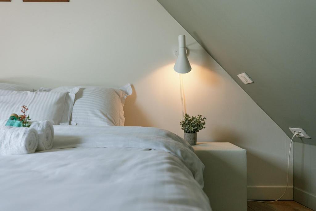 Postel nebo postele na pokoji v ubytování Huswell - Bonrepo Room 105