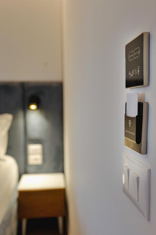 Postel nebo postele na pokoji v ubytování HOTEL RENATO