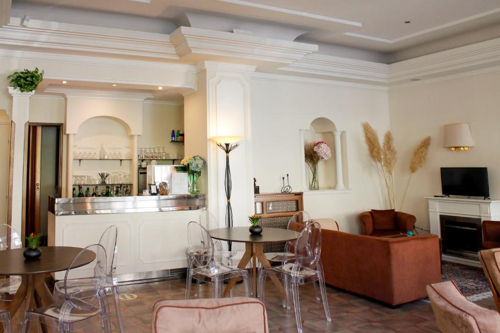 TV a/nebo společenská místnost v ubytování Hotel Delle Ortensie