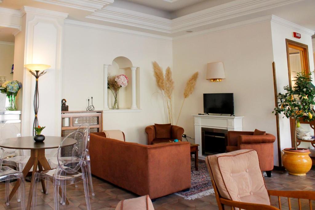 TV a/nebo společenská místnost v ubytování Hotel Delle Ortensie