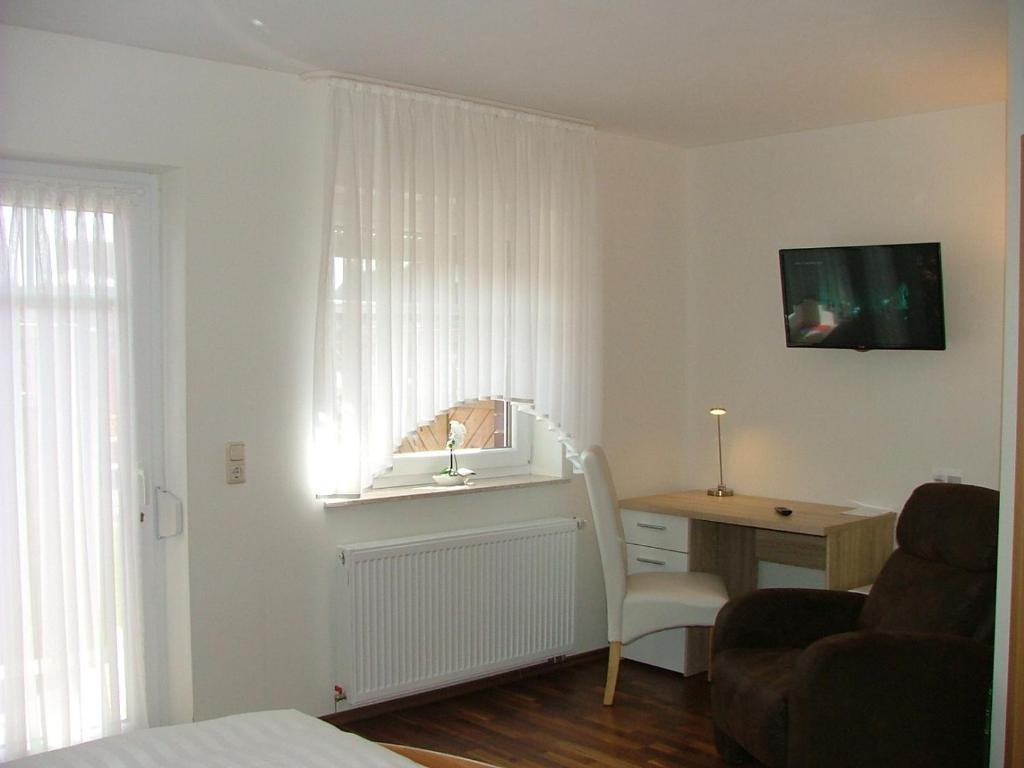 TV a/nebo společenská místnost v ubytování Hotel Thule