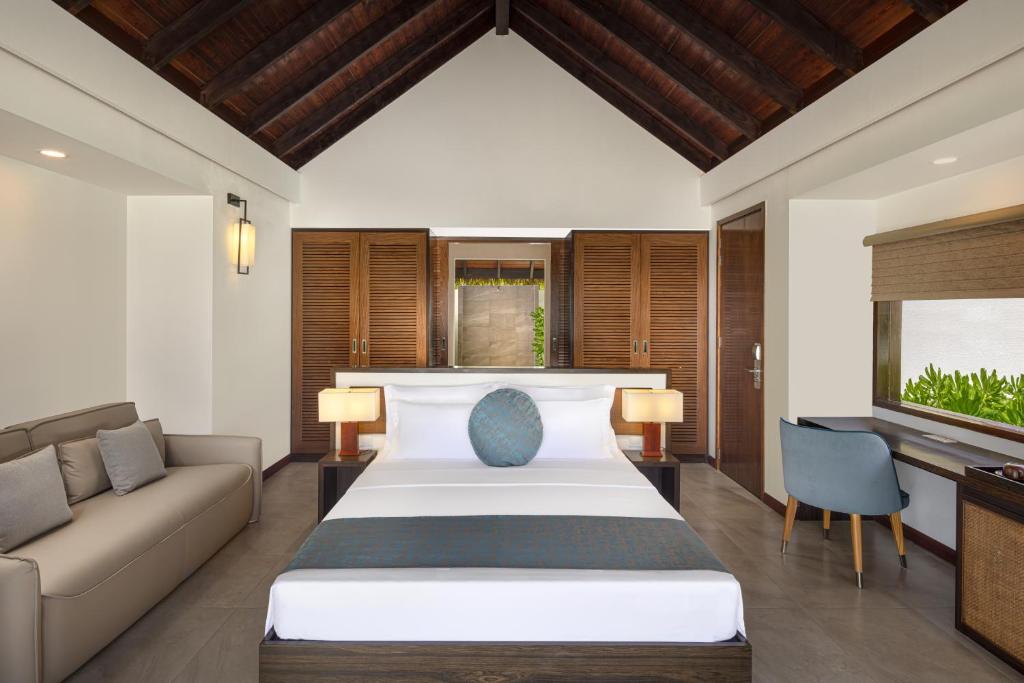 Postel nebo postele na pokoji v ubytování NOOE Maldives Kunaavashi - Stay 5 nights or more and get Free Speed Boat Transfers - And the Offer valid till 25th August 2025 and Stay Period till 30th September