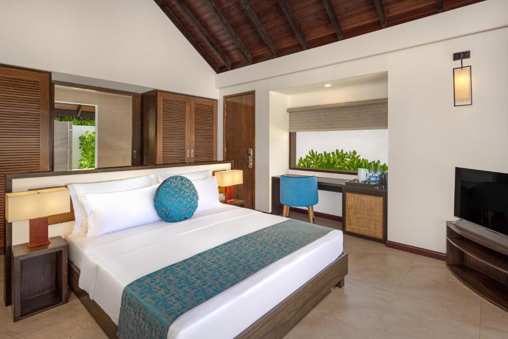 Postel nebo postele na pokoji v ubytování NOOE Maldives Kunaavashi - Stay 5 nights or more and get Free Speed Boat Transfers - And the Offer valid till 25th August 2025 and Stay Period till 30th September