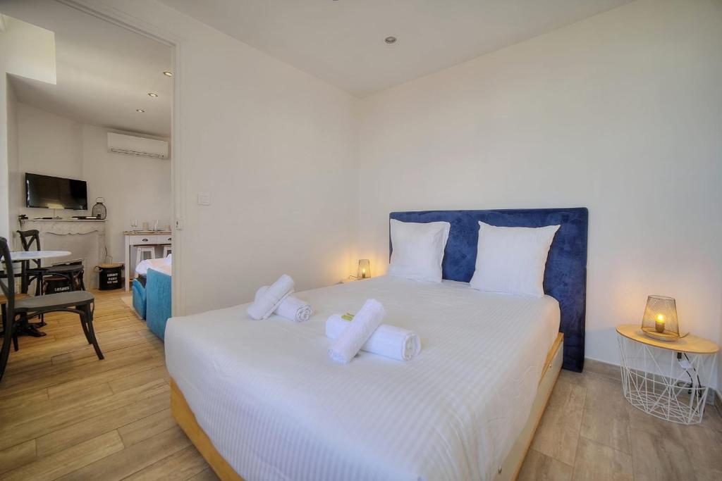 Posteľ alebo postele v izbe v ubytovaní IMMOGROOM-Suquet-AC-WIFI-close to the beaches