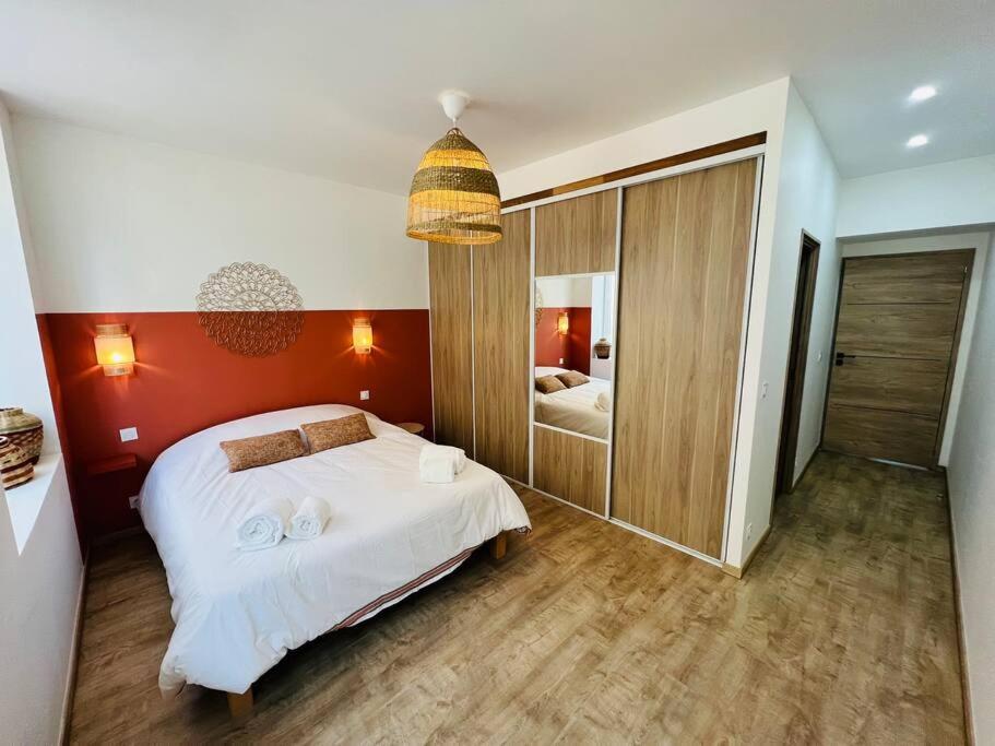 Posteľ alebo postele v izbe v ubytovaní Appartement cosy centre-ville