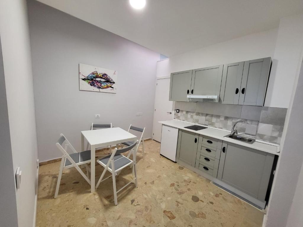 Kuchyň nebo kuchyňský kout v ubytování Resort Suites Vecindario