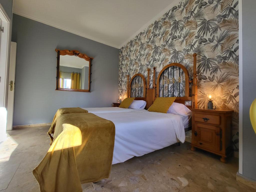 Postel nebo postele na pokoji v ubytování Resort Suites Vecindario