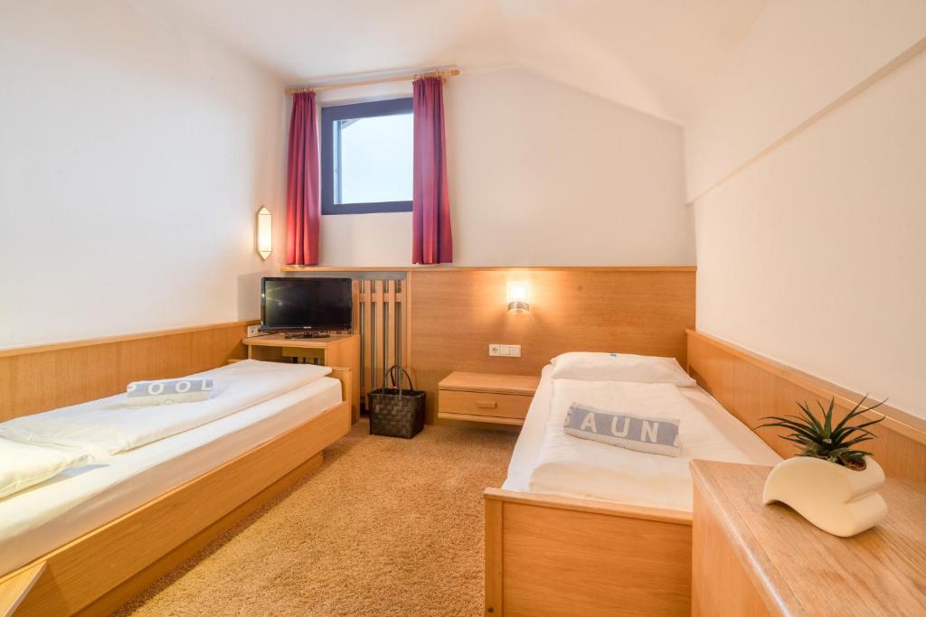 Postel nebo postele na pokoji v ubytování Piccolo Hotel Gurschler
