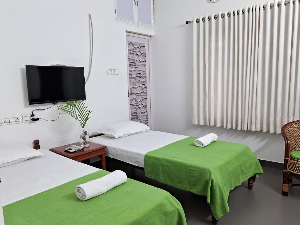 Postel nebo postele na pokoji v ubytování Mi Casa Tu Casa Homestay