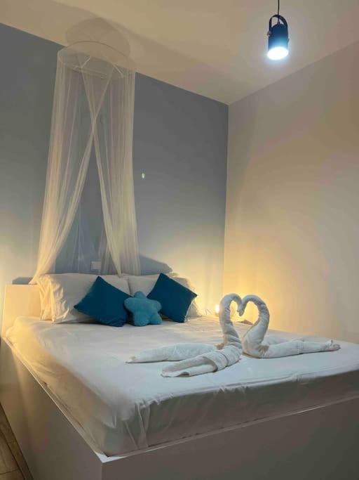 Postel nebo postele na pokoji v ubytování Sissi Olive home