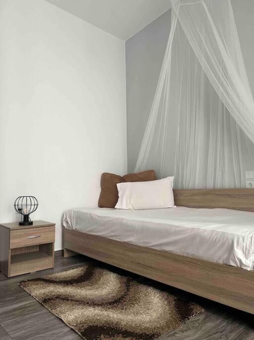 Postel nebo postele na pokoji v ubytování Sissi Olive home
