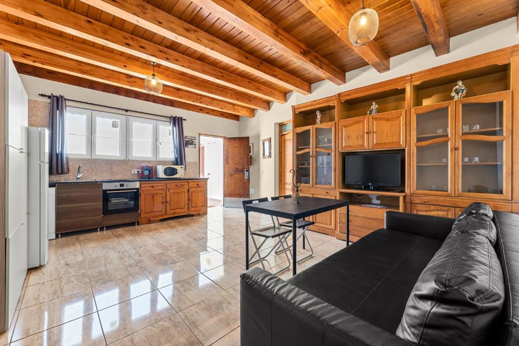 Televízia a/alebo spoločenská miestnosť v ubytovaní E Ensuite Vacation Apartment LANZAROTE