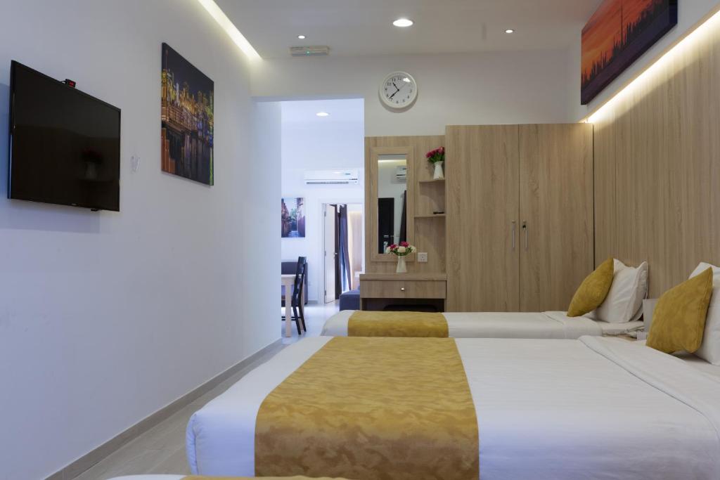 Postel nebo postele na pokoji v ubytování 24 Gold Hotel