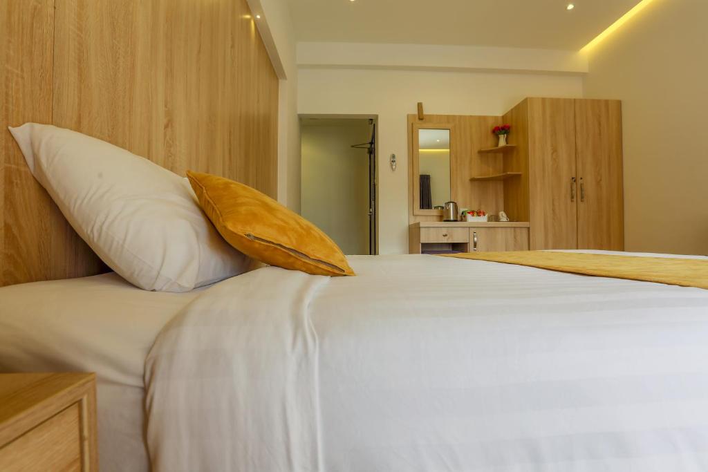 Postel nebo postele na pokoji v ubytování 24 Gold Hotel