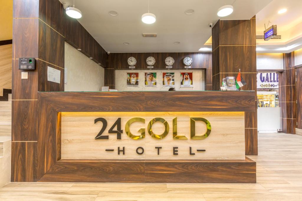 a sign for a zodel hotel in a store at 24 Gold Hotel in Dubai