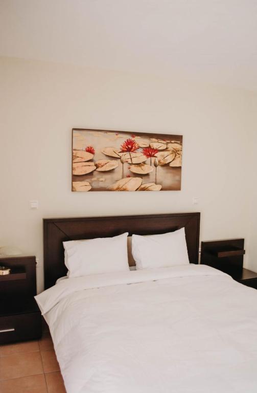 Posteľ alebo postele v izbe v ubytovaní Obrava Guesthouse Kotroni Trikalon