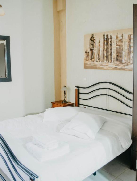 Posteľ alebo postele v izbe v ubytovaní Obrava Guesthouse Kotroni Trikalon