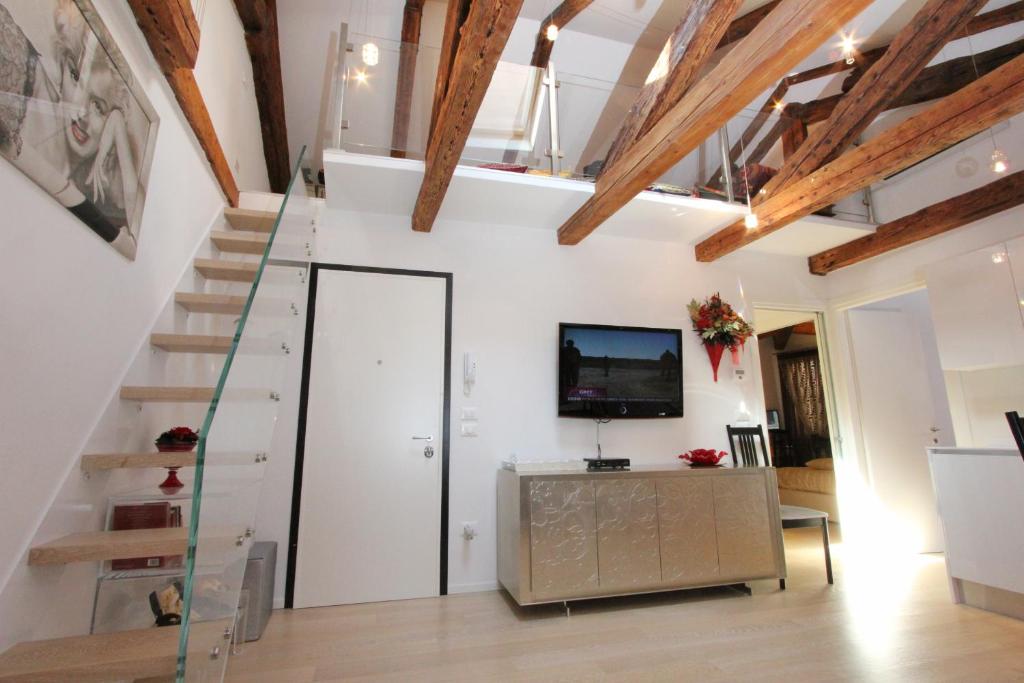 Telewizja i/lub zestaw kina domowego w obiekcie City Apartments Rialto
