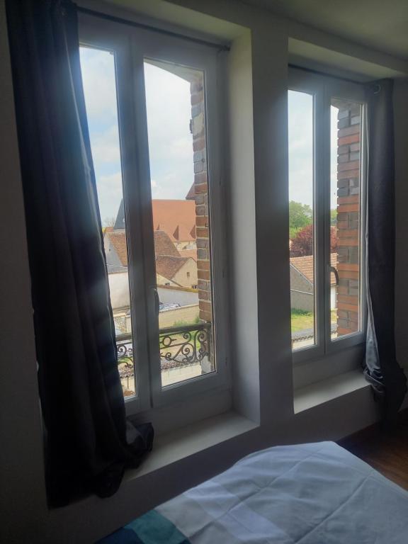 Posteľ alebo postele v izbe v ubytovaní logement entier spacieux et confortable à 1 h de Paris