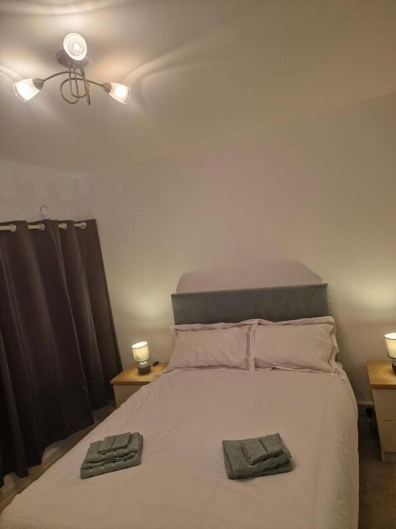 Postel nebo postele na pokoji v ubytování The Lodge Ballina