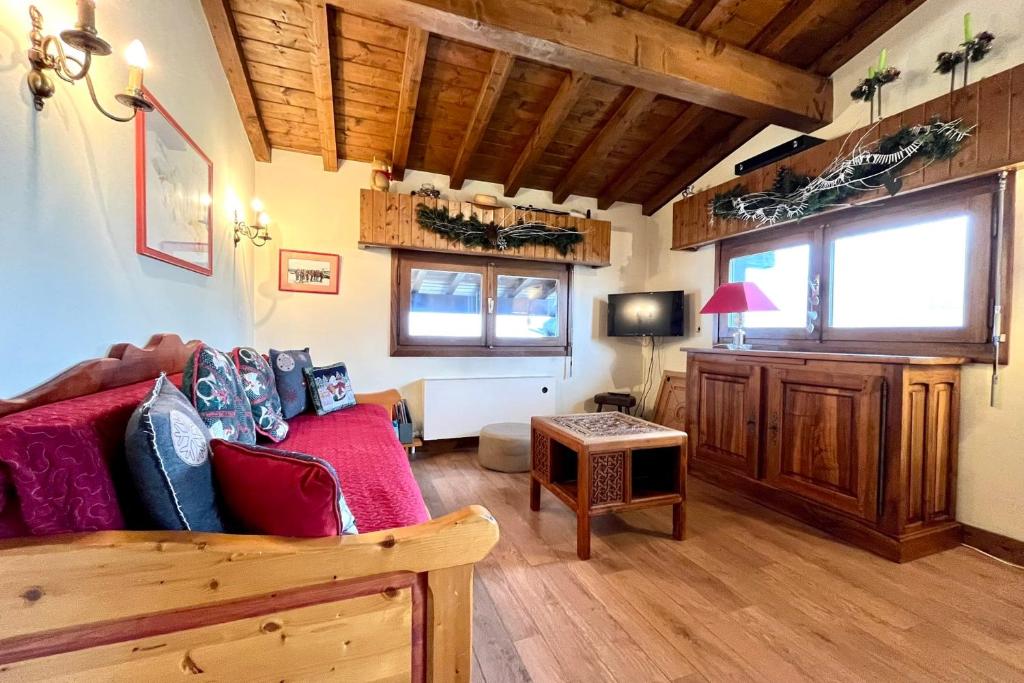 Televízia a/alebo spoločenská miestnosť v ubytovaní Nice and bright apartment in Combloux