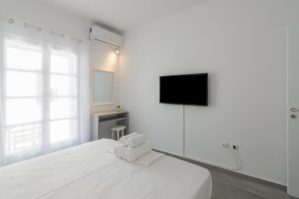 Postel nebo postele na pokoji v ubytování Marvelous One Bedroom House In Paros