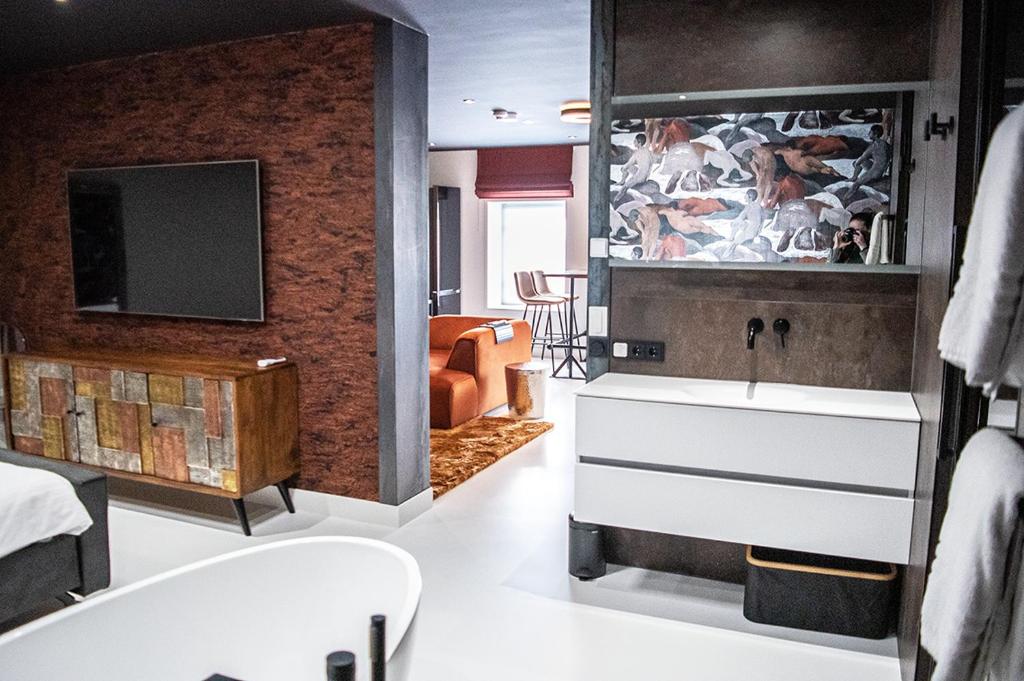 TV a/nebo společenská místnost v ubytování "DE BANK" - Hotel Apartments