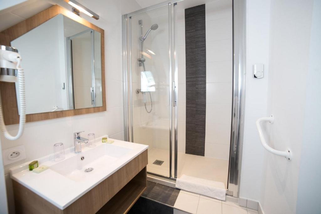 Koupelna v ubytování Hôtel An Ti Gwenn