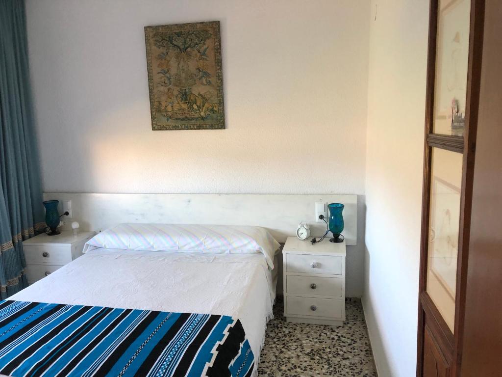 Postel nebo postele na pokoji v ubytování Villa Aeroclub REF. 002