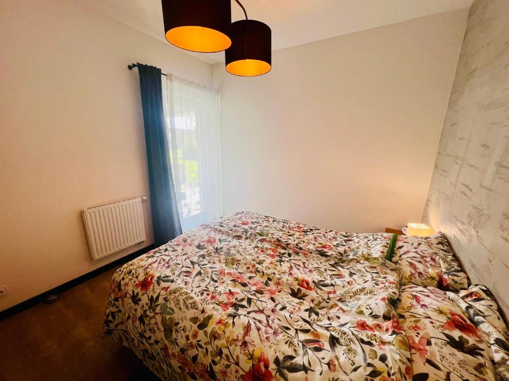 Posteľ alebo postele v izbe v ubytovaní Apartament Morsa w Nautica Resort