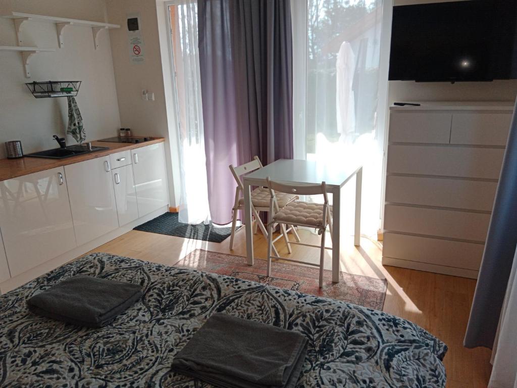 Apartamenty i Domki Osińscy - Ático