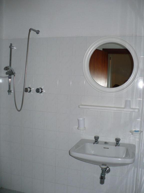 Koupelna v ubytování Albergo Villa-Brandi --- PENSIONE COMPLETA ---