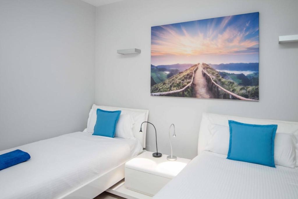 Postel nebo postele na pokoji v ubytování Lightbooking piscina privada Salobre Golf
