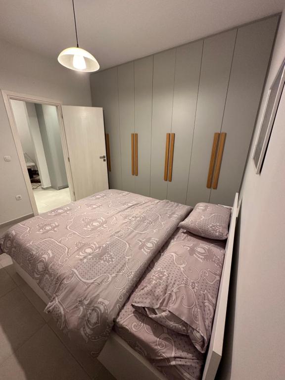 Postel nebo postele na pokoji v ubytování A&A Apartment